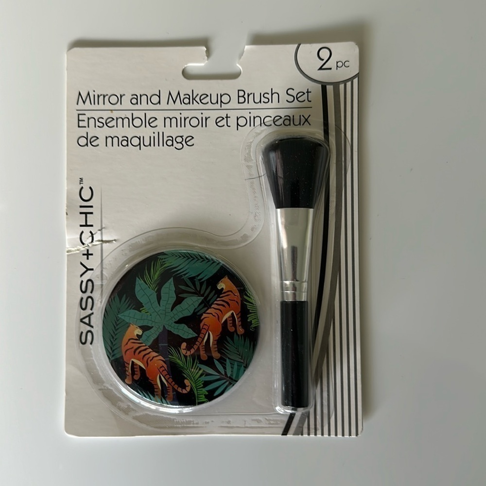 Mirror and makeup brush set